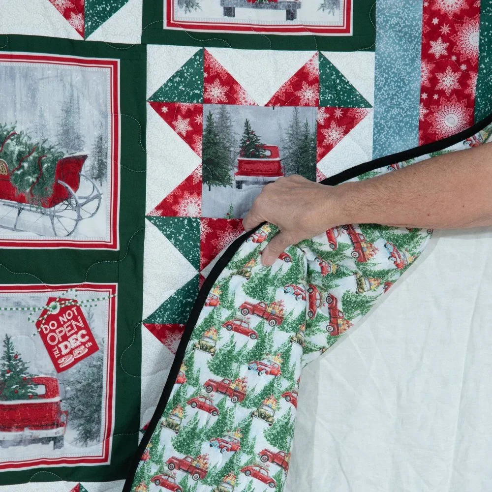 Beautiful, New, Handmade Christmas Quilt of red trucks and Christmas trees